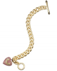 Juicy Couture's lovely bracelet gets your heart racing with a banner heart charm embellished with pink pave accents. Complete with a toggle closure. Chain crafted in gold tone stainless steel. Charms crafted in gold tone mixed metal. Approximate length: 7 inches. Approximate drop: 1 inch. Juicy Couture's lovely bracelet gets your heart racing with a banner heart charm embellished with pink pave accents. Complete with a toggle closure. Chain crafted in gold tone stainless steel. Charms crafted in gold tone mixed metal. Approximate length: 7 inches. Approximate drop: 1 inch.