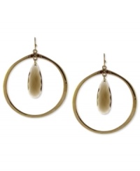Topaz takes center stage on these hoop earrings from Jessica Simpson. The hoops are crafted from gold tone mixed metal. Approximate drop: 3 inches. Topaz takes center stage on these hoop earrings from Jessica Simpson. The hoops are crafted from gold tone mixed metal. Approximate drop: 3 inches.