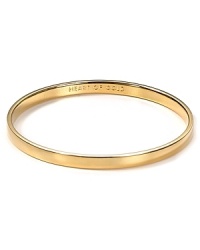 Understated alone and statement making when stacked. kate spade new york's engraved gold-plated bangle gives every look the Midas touch. Understated alone and statement making when stacked. kate spade new york's engraved gold-plated bangle gives every look the Midas touch.