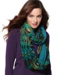 Proudly flaunt your boho chic fashion: a vibrant peacock-print loop scarf from Collection XIIX. Proudly flaunt your boho chic fashion: a vibrant peacock-print loop scarf from Collection XIIX.