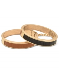 Grab some venomous fashion with this GUESS bracelet set. This set of 2 bangles feature golden bracelets with black and tan snake detail. Crafted in gold tone mixed metal. Approximate diameter: 2-1/4 inches. Grab some venomous fashion with this GUESS bracelet set. This set of 2 bangles feature golden bracelets with black and tan snake detail. Crafted in gold tone mixed metal. Approximate diameter: 2-1/4 inches.