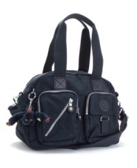 A chic convertible silhouette from Kipling that's both functional and fashionable. Each Kipling bag is crafted from water resistant nylon and features a collectible charm. A chic convertible silhouette from Kipling that's both functional and fashionable. Each Kipling bag is crafted from water resistant nylon and features a collectible charm.