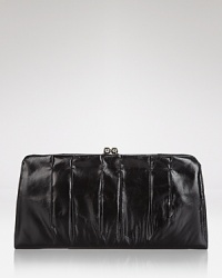 Effortlessly blending style and functionality, this Hobo clutch is a polished pick up, crafted of leather with a lined interior which features spots for the essentials. Effortlessly blending style and functionality, this Hobo clutch is a polished pick up, crafted of leather with a lined interior which features spots for the essentials.