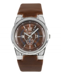 A pop of blue spices up this minimalist watch by Unlisted. Brown leather strap and round silver tone mixed metal case. Brown dial features silver tone numerals at twelve, three and nine o'clock, stick indices, second subdial, luminous hands, logo and blue accents. Quartz movement. Splash resistant. Two-year limited warranty. A pop of blue spices up this minimalist watch by Unlisted. Brown leather strap and round silver tone mixed metal case. Brown dial features silver tone numerals at twelve, three and nine o'clock, stick indices, second subdial, luminous hands, logo and blue accents. Quartz movement. Splash resistant. Two-year limited warranty.