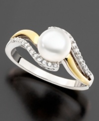 The simplicity of a stunning cultured freshwater pearl (7 mm) beautifully contrasts with an elegant setting of sterling silver, 14k gold and round-cut diamond accents on this lovely ring. The simplicity of a stunning cultured freshwater pearl (7 mm) beautifully contrasts with an elegant setting of sterling silver, 14k gold and round-cut diamond accents on this lovely ring.