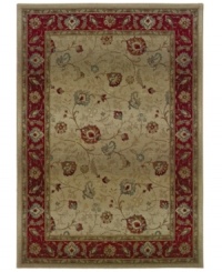 Pristine patterns swirl gracefully against a neutral ground, surrounded by a vivid red border that holds various vines and blossoms. Pristine patterns swirl gracefully against a neutral ground, surrounded by a vivid red border that holds various vines and blossoms.