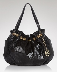 MICHAEL Michael Kors' luxe take all-American style proves casual with this roomy straw tote. Whether as a beach bag or at-work carryall, this bag has a practical ring to it. MICHAEL Michael Kors' luxe take all-American style proves casual with this roomy straw tote. Whether as a beach bag or at-work carryall, this bag has a practical ring to it.