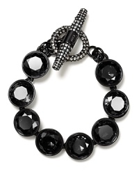 Round faceted stones light up your wrist. Bracelet by Juicy Couture. Round faceted stones light up your wrist. Bracelet by Juicy Couture.