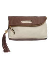 Incredibly supple leather lends a slouchy feel to the oversize Juliann Clutch from Vince Camuto. This reversible, foldover clutch has contrasting colors on both sides that can be flipped to highlight either tone, a zipper closure and luxe horn and tassel detailing at the closure. Incredibly supple leather lends a slouchy feel to the oversize Juliann Clutch from Vince Camuto. This reversible, foldover clutch has contrasting colors on both sides that can be flipped to highlight either tone, a zipper closure and luxe horn and tassel detailing at the closure.