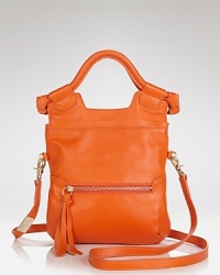 Size down for daytime with this crossbody bag from Foley + Corrina. A pint-sized version of their classic crossbody, it's a little statement piece. Size down for daytime with this crossbody bag from Foley + Corrina. A pint-sized version of their classic crossbody, it's a little statement piece.