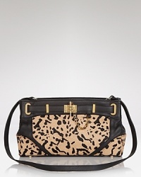 The power clutch is the bag we want now, and this style from Rachel Zoe works the trend with textured allure, crafted of cow fur with a statement shape. The power clutch is the bag we want now, and this style from Rachel Zoe works the trend with textured allure, crafted of cow fur with a statement shape.