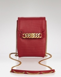 No need to dress it up, this MARC BY MARC JACOBS mini bag's glittering gold detailing is just as sassy as what you're wearing underneath. No need to dress it up, this MARC BY MARC JACOBS mini bag's glittering gold detailing is just as sassy as what you're wearing underneath.