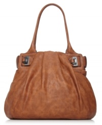 Simply irresistible. This practical yet polished piece from Jessica Simpson will take you from deskside to dinner without missing a beat. Adorned with buckle accents and ruched detailing, its roomy interior stows all the essentials on or off duty. Simply irresistible. This practical yet polished piece from Jessica Simpson will take you from deskside to dinner without missing a beat. Adorned with buckle accents and ruched detailing, its roomy interior stows all the essentials on or off duty.