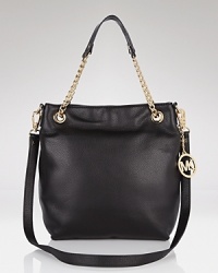 Do the white thing. MICHAEL Michael Kors chain-trimmed shoulder bag adds modern glamour to this season's high-shine separates. Do the white thing. MICHAEL Michael Kors chain-trimmed shoulder bag adds modern glamour to this season's high-shine separates.