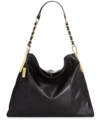 Laid-back luxe meets standout styling with this prêt-à-porter design from Ivanka Trump. Faux lizard-embossed leather and chain-link detailing lend exotic appeal, while the spacious interior provides room for all the essentials. Laid-back luxe meets standout styling with this prêt-à-porter design from Ivanka Trump. Faux lizard-embossed leather and chain-link detailing lend exotic appeal, while the spacious interior provides room for all the essentials.