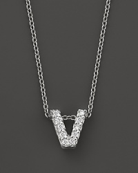 From the Tiny Treasures collection, a diamond V necklace. With signature ruby accent. Designed by Roberto Coin. From the Tiny Treasures collection, a diamond V necklace. With signature ruby accent. Designed by Roberto Coin.