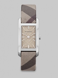 A true signature design with a check etched dial and a check strap. Quartz movementWater resistant to 3 ATMRectangular stainless steel case, 20mm (0.8) X 26mm (1)Smooth bezelSilver check stamped dialBar hour markersTrench smoke check strapMade in Switzerland A true signature design with a check etched dial and a check strap. Quartz movementWater resistant to 3 ATMRectangular stainless steel case, 20mm (0.8) X 26mm (1)Smooth bezelSilver check stamped dialBar hour markersTrench smoke check strapMade in Switzerland