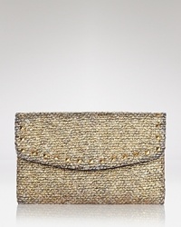 Elements of shimmer give this tweed Cornelia Guest clutch a touch of glitz that shines on when the ordinary evening bag just won't do. Elements of shimmer give this tweed Cornelia Guest clutch a touch of glitz that shines on when the ordinary evening bag just won't do.