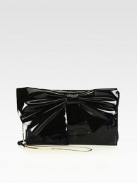 A chic, yet feminine style with a large coated canvas bow front.Detachable adjustable shoulder chain strap, 21½-22 dropMagnetic snap flap closureOne inside zip pocketTwo inside open pocketsSatin lining11¼W X 7H X 1¼DMade in Italy A chic, yet feminine style with a large coated canvas bow front.Detachable adjustable shoulder chain strap, 21½-22 dropMagnetic snap flap closureOne inside zip pocketTwo inside open pocketsSatin lining11¼W X 7H X 1¼DMade in Italy