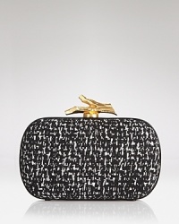 This smart, DIANE von FURSTENBERG tweed clutch is a study in understated after-hours accessorizing. This smart, DIANE von FURSTENBERG tweed clutch is a study in understated after-hours accessorizing.