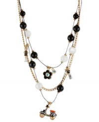 Go along for the ride. This illusion necklace from Betsey Johnson is crafted from gold-tone mixed metal with a scooter-styled charm at the center, and crystal accents and black and white beads adding a stylish touch. Approximate length: 16 inches + 3-inch extender. Approximate drop: 3-1/2 inches. Go along for the ride. This illusion necklace from Betsey Johnson is crafted from gold-tone mixed metal with a scooter-styled charm at the center, and crystal accents and black and white beads adding a stylish touch. Approximate length: 16 inches + 3-inch extender. Approximate drop: 3-1/2 inches.