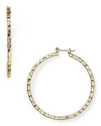 Opt for high-impact basics like this pair of gleaming faceted hoop earrings from RJ Graziano. This hammered pair are a jewel box staple that you'll reach for again and again. Opt for high-impact basics like this pair of gleaming faceted hoop earrings from RJ Graziano. This hammered pair are a jewel box staple that you'll reach for again and again.