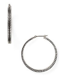 Glamor defined: subtle texture gives these silver-plated hoop earrings from Lauren Ralph Lauren added dimension. Wear them to take your look from simple to striking. Glamor defined: subtle texture gives these silver-plated hoop earrings from Lauren Ralph Lauren added dimension. Wear them to take your look from simple to striking.