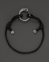 Eastern elements inform John Hardy's dragon head bracelet. It features a cotton cord band with an adjustable sliding closure.
