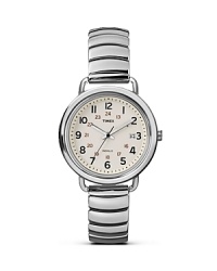 Inspired by functional, industrial style, this off-white watch from Timex has a minimalist design, punctuated by a sleek stainless steel bracelet. Inspired by functional, industrial style, this off-white watch from Timex has a minimalist design, punctuated by a sleek stainless steel bracelet.