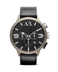 A sleek perforated leather band is a cool complement to this Armani Exchange watch, which works a handsome edge, styled with a three-eye chronograph dial and polished markers. A sleek perforated leather band is a cool complement to this Armani Exchange watch, which works a handsome edge, styled with a three-eye chronograph dial and polished markers.