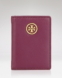 Tory Burch's leather transit pass holder is an elegant way to keep the essentials organized. In uptown style, it flaunts ample interior pockets and a subtle designer plaque. Tory Burch's leather transit pass holder is an elegant way to keep the essentials organized. In uptown style, it flaunts ample interior pockets and a subtle designer plaque.