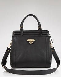 Tory Burch blends its signature polish with cool allure. Structured and a little bit ladylike, this day-right style is a work-to-weekend essential whether you kick it up or downtown. Tory Burch blends its signature polish with cool allure. Structured and a little bit ladylike, this day-right style is a work-to-weekend essential whether you kick it up or downtown.