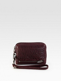 A beautifully textured style with a wrist strap for hands-free convenience.Wrist strap, 6½ dropTop zip closureOne outside zip pocketFour credit card slotsTwo inner compartmentsFully lined4½W X 6¼H X 1½DImported A beautifully textured style with a wrist strap for hands-free convenience.Wrist strap, 6½ dropTop zip closureOne outside zip pocketFour credit card slotsTwo inner compartmentsFully lined4½W X 6¼H X 1½DImported