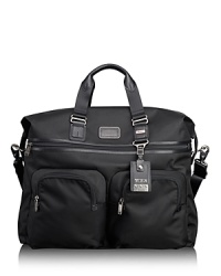 Rendered in ballistic nylon with leather trim, the Alpha Bravo series offers classic styling details and strong organizational pockets, functioning seamlessly across work, travel and casual environments. With a roomy interior, the duffel easily packs your essentials for an overnight or weekend trip. Rendered in ballistic nylon with leather trim, the Alpha Bravo series offers classic styling details and strong organizational pockets, functioning seamlessly across work, travel and casual environments. With a roomy interior, the duffel easily packs your essentials for an overnight or weekend trip.