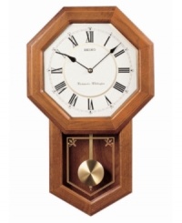 With geometric styling, this charming wall clock from Seiko is the perfect complement for any room. Solid oak case with glass window and brass pendulum. White octagonal dial with logo and roman numeral indices. Westminster/Whittington quarter-hour chime and hourly strikes. Volume control and nighttime silencer. One C battery included. Measures approximately 21-1/4 x 12-3/4 x 3-3/4 inches. With geometric styling, this charming wall clock from Seiko is the perfect complement for any room. Solid oak case with glass window and brass pendulum. White octagonal dial with logo and roman numeral indices. Westminster/Whittington quarter-hour chime and hourly strikes. Volume control and nighttime silencer. One C battery included. Measures approximately 21-1/4 x 12-3/4 x 3-3/4 inches.