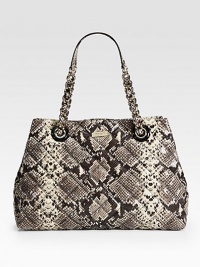 A quilted style in luxurious snake embossed leather with a chic chain strap.Double chain and snake embossed leather shoulder straps, 8½ dropMagnetic snap closureOne zip and two open inner compartmentsOne inside zip pocketTwo inside open pocketsJacquard lining15W X 11H X 5½DImported A quilted style in luxurious snake embossed leather with a chic chain strap.Double chain and snake embossed leather shoulder straps, 8½ dropMagnetic snap closureOne zip and two open inner compartmentsOne inside zip pocketTwo inside open pocketsJacquard lining15W X 11H X 5½DImported