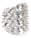Fall for the textured allure of this scale-like statement cuff, which is crafted from rhodium tone plate. By Alexis Bittar.