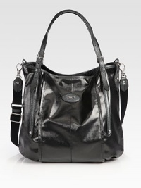 Glossy and textured coated canvas with beautiful pebbled leather trim in a roomy carryall design.Double adjustable leather top handles, 2½-9½ dropDetachable adjustable shoulder strap, 12-18¾ dropSnap button closureProtective metal feetOne inside zip pocketOne inside open pocketFully lined13W X 10½H X 8DMade in Italy Glossy and textured coated canvas with beautiful pebbled leather trim in a roomy carryall design.Double adjustable leather top handles, 2½-9½ dropDetachable adjustable shoulder strap, 12-18¾ dropSnap button closureProtective metal feetOne inside zip pocketOne inside open pocketFully lined13W X 10½H X 8DMade in Italy