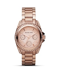 Give into the the glitz with this crystal-adorned watch from MICHAEL Michael Kors. Sleek and sophisticated, it's lends every look a hint of practical sparkle. Give into the the glitz with this crystal-adorned watch from MICHAEL Michael Kors. Sleek and sophisticated, it's lends every look a hint of practical sparkle.