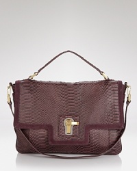 Be the envy of all your friends with this exotically styled satchel from Juicy Couture. It flaunts a carry-it-all shape that looks extra luxe in printed leather. Be the envy of all your friends with this exotically styled satchel from Juicy Couture. It flaunts a carry-it-all shape that looks extra luxe in printed leather.