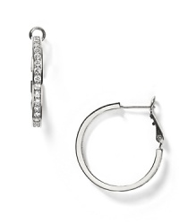 A sophisticated sparkle is yours with these inside-out pierced earrings. Fine cubic zirconia studs are mixed with sterling silver with a platinum finish. A sophisticated sparkle is yours with these inside-out pierced earrings. Fine cubic zirconia studs are mixed with sterling silver with a platinum finish.