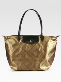 Signature equestrian print defines this roomy coated canvas carryall accented with luxurious leather trim.Double leather top handles, 4½ dropTop zip closure with snap button flapOne inside open pocketCotton lining12¼W X 11¾H X 7½DImported Signature equestrian print defines this roomy coated canvas carryall accented with luxurious leather trim.Double leather top handles, 4½ dropTop zip closure with snap button flapOne inside open pocketCotton lining12¼W X 11¾H X 7½DImported