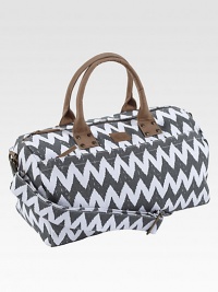 A bold zigzag pattern looks fresh and smart, printed on sturdy cotton and fashioned into a roomy duffel.Top zip closureLeather double handlesDetachable, adjustable shoulder strapInside and outside zip pockets18¾L X 9½H X 9¼DCottonSpot cleanImported A bold zigzag pattern looks fresh and smart, printed on sturdy cotton and fashioned into a roomy duffel.Top zip closureLeather double handlesDetachable, adjustable shoulder strapInside and outside zip pockets18¾L X 9½H X 9¼DCottonSpot cleanImported