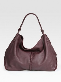This supple, pebbled leather style blends functionality with chic style with whip-stitched accents throughout.Shoulder strap, 7½ dropOpen topOne inside zip pocketOne inside open pocketSuede lining16W X 12½H X 8DMade in Italy This supple, pebbled leather style blends functionality with chic style with whip-stitched accents throughout.Shoulder strap, 7½ dropOpen topOne inside zip pocketOne inside open pocketSuede lining16W X 12½H X 8DMade in Italy