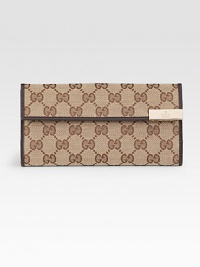 Continental wallet with gucci trademark engraved metal plate in GG fabric with leather trim/interior and light goldtone hardware.Snap closure Two bill compartments Seven card slots Coin pocket Fully lined 7½W X 4H X 1D Made in Italy Continental wallet with gucci trademark engraved metal plate in GG fabric with leather trim/interior and light goldtone hardware.Snap closure Two bill compartments Seven card slots Coin pocket Fully lined 7½W X 4H X 1D Made in Italy