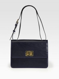 Butter-smooth leather takes on a lady-like silhouette in this gorgeous flap design finished with polished turnlock hardware.Adjustable shoulder strap, 9½-11¾ dropTurnlock flap closureOne outside open pocketOne inside zip pocketThree inner compartmentsLeather lining11W X 8H X 3½DMade in Italy Butter-smooth leather takes on a lady-like silhouette in this gorgeous flap design finished with polished turnlock hardware.Adjustable shoulder strap, 9½-11¾ dropTurnlock flap closureOne outside open pocketOne inside zip pocketThree inner compartmentsLeather lining11W X 8H X 3½DMade in Italy