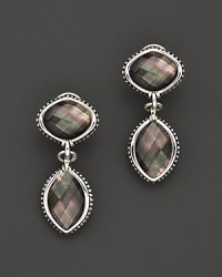 Black mother-of-pearl doublets in gleaming caviar settings of sterling silver. Black mother-of-pearl doublets in gleaming caviar settings of sterling silver.
