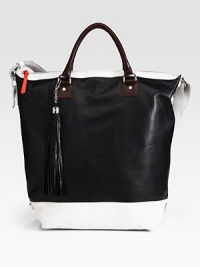 Rich leather in a classic bucket silhouette, accented with a chic oversized tassel at the handles.Double top handles, 5 dropAdjustable shoulder strap, 9-10 dropTop zip closureOne inside zip pocketThree inside open pocketsCotton lining16½W X 16½H X 6¾DImported Rich leather in a classic bucket silhouette, accented with a chic oversized tassel at the handles.Double top handles, 5 dropAdjustable shoulder strap, 9-10 dropTop zip closureOne inside zip pocketThree inside open pocketsCotton lining16½W X 16½H X 6¾DImported