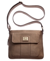 A triple treat. This diva-worthy design from AK Anne Klein is decidedly the perfect purse. With a front flap pocket, signature hardware and adjustable crossbody strap, it's ready for anything your day delivers. A triple treat. This diva-worthy design from AK Anne Klein is decidedly the perfect purse. With a front flap pocket, signature hardware and adjustable crossbody strap, it's ready for anything your day delivers.