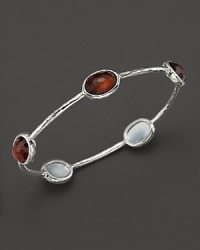 Faceted doublets of clear quartz, cinnamon and mother-of-pearl in a sterling silver bangle. From the Ippolita Wonderland Collection. Faceted doublets of clear quartz, cinnamon and mother-of-pearl in a sterling silver bangle. From the Ippolita Wonderland Collection.